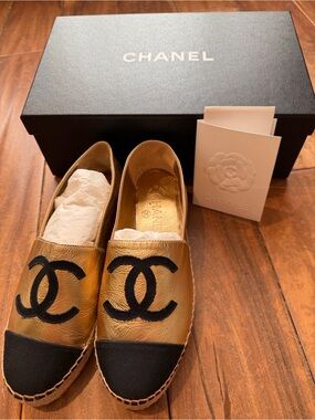 CHANEL Gold Leather Espadrilles with Black Cap Toe and CC Logo